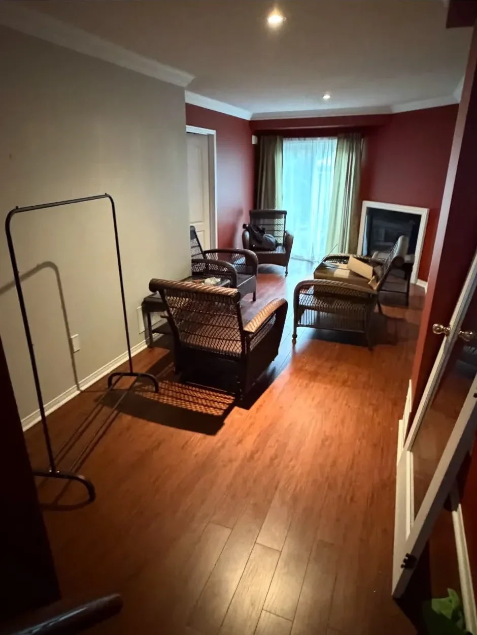 Hardwood staircase landing before renovation